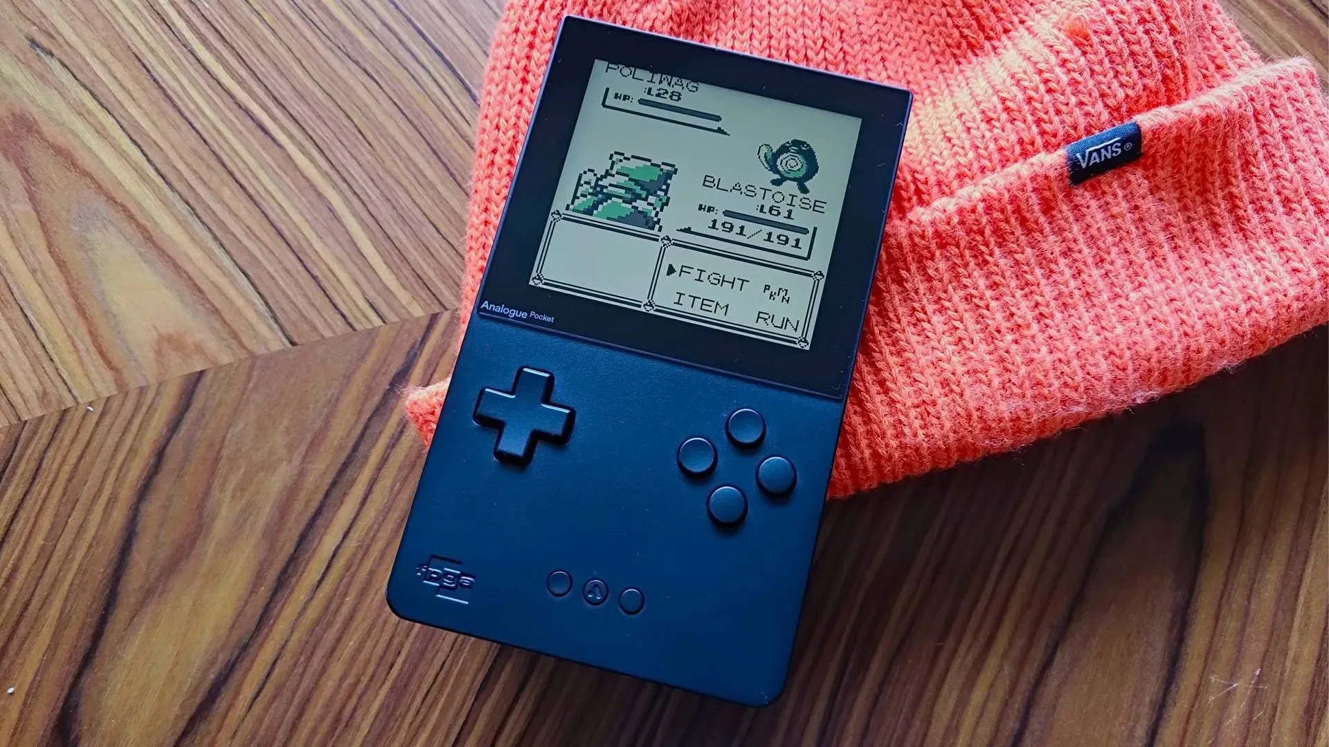 Analogue Pocket handheld displaying a Super NES FPGA core menu