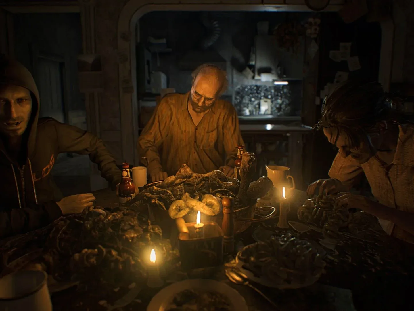 Three people sit around a table in Resident Evil 7