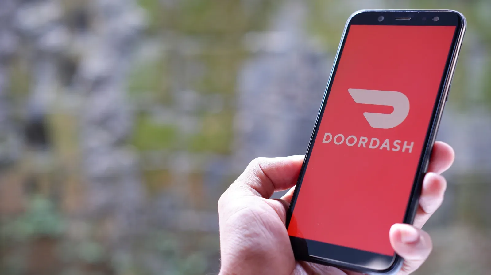 DoorDash and Instacart logos representing the proposed $17 billion acquisition