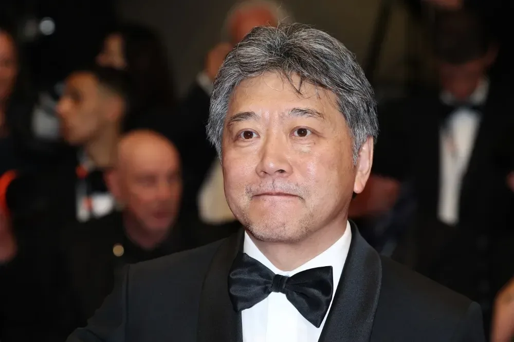 Hirokazu Kore-eda speaking during a film festival presentation