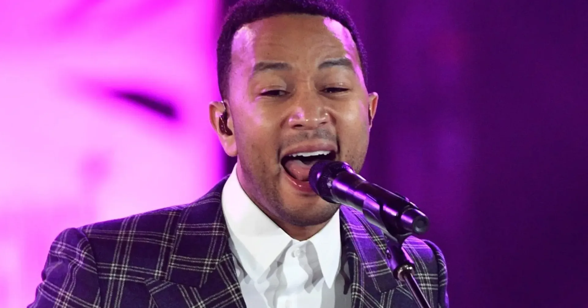 John Legend and Jay-Z performing together at SoFi Stadium