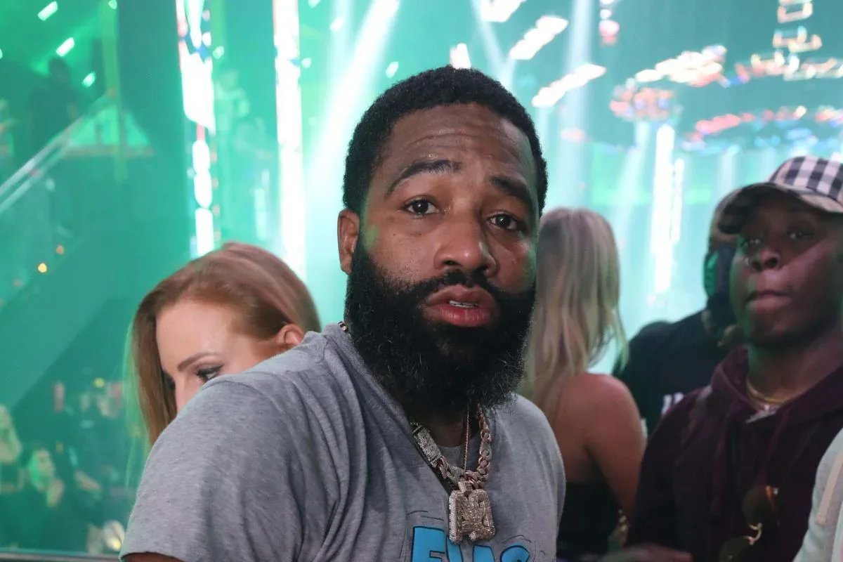 Adrien Broner and DeenTheGreat in promotional imagery for “Purple App Killa”