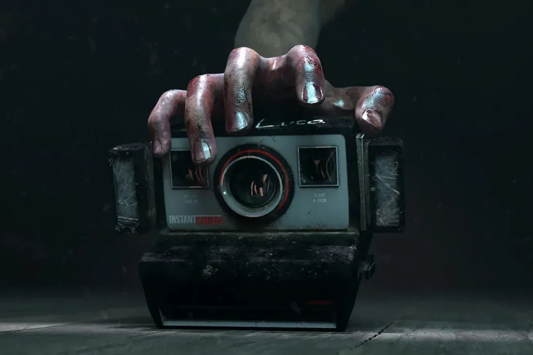 Madison instant camera and haunted-house horror imagery