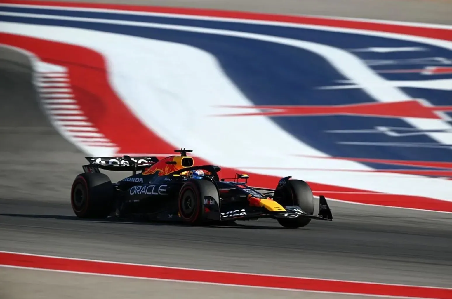 Formula 1 cars racing at Circuit of the Americas during the United States Grand Prix