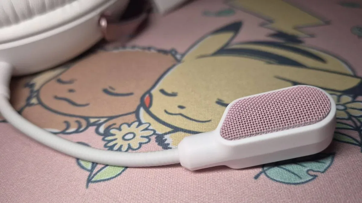 White-and-pink HyperX Cloud III over-ear headset with metal yokes