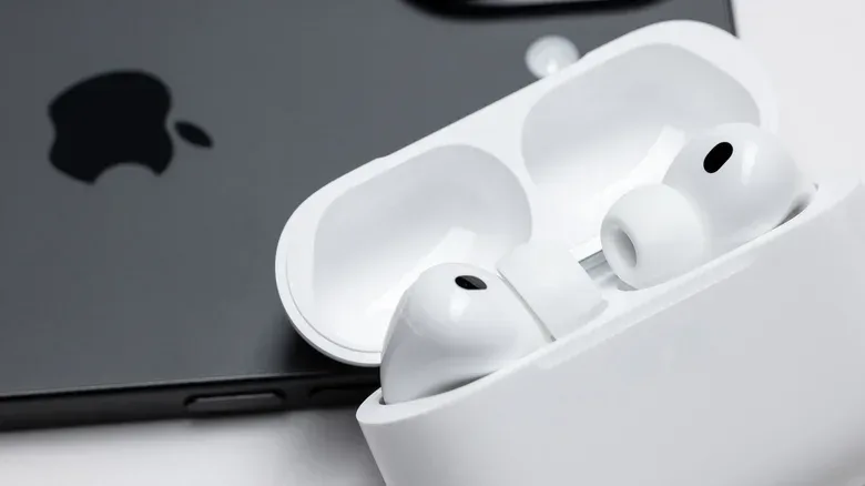 iPhone Control Center audio output menu with AirPods selected