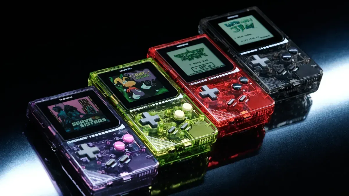 ModRetro transparent Chromatic handhelds in purple, green, red and smoke colorways