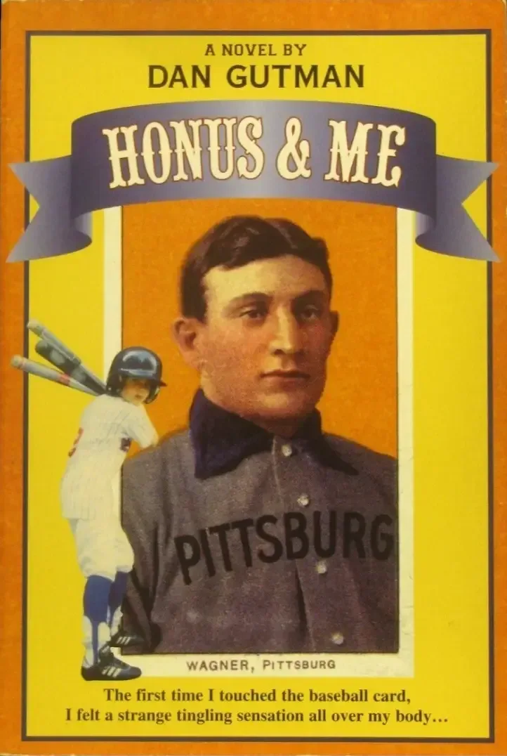 Restored 1909 T206 Sweet Caporal Honus Wagner baseball card with orange background