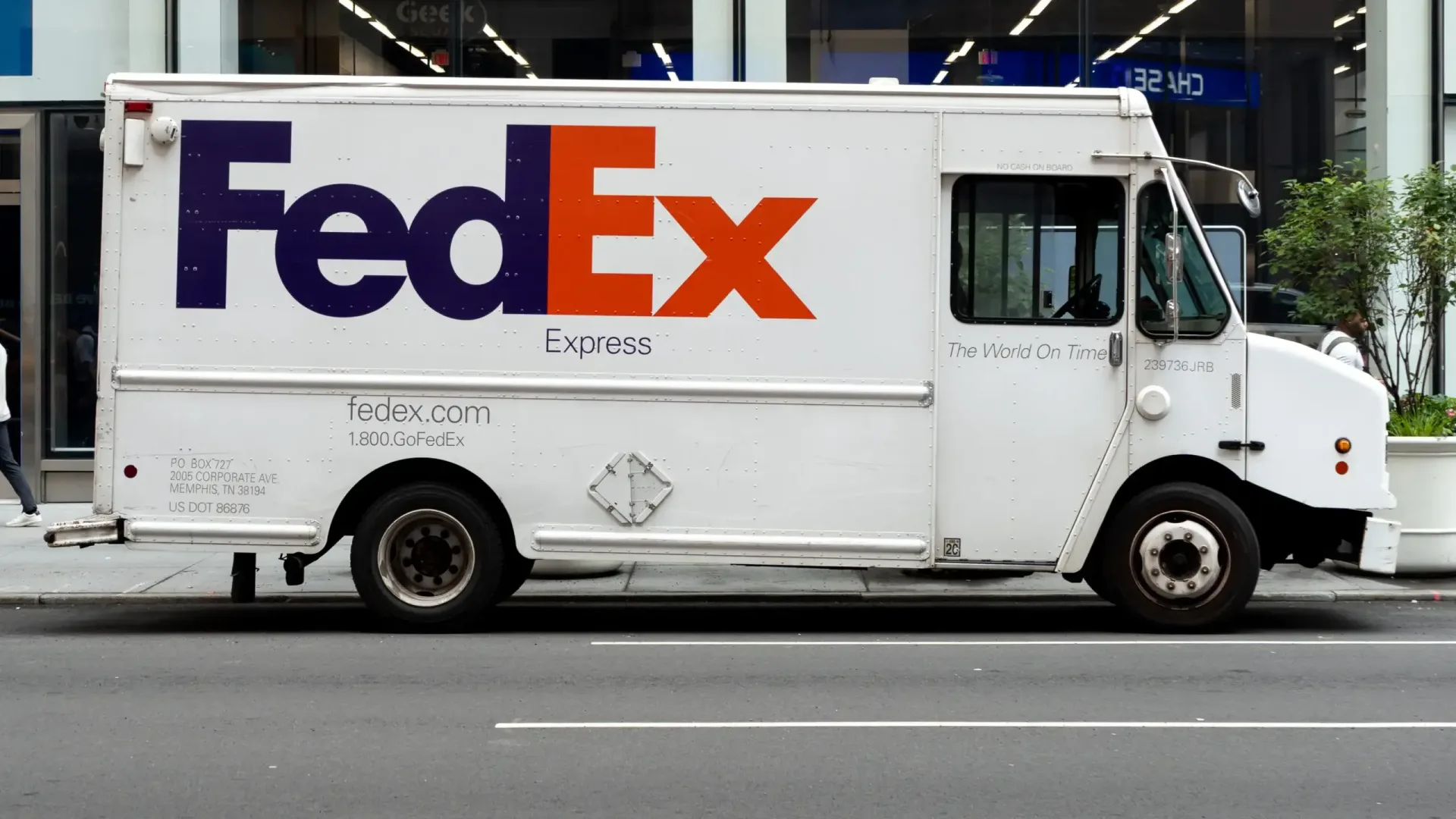 FedEx delivery truck near a shipping facility