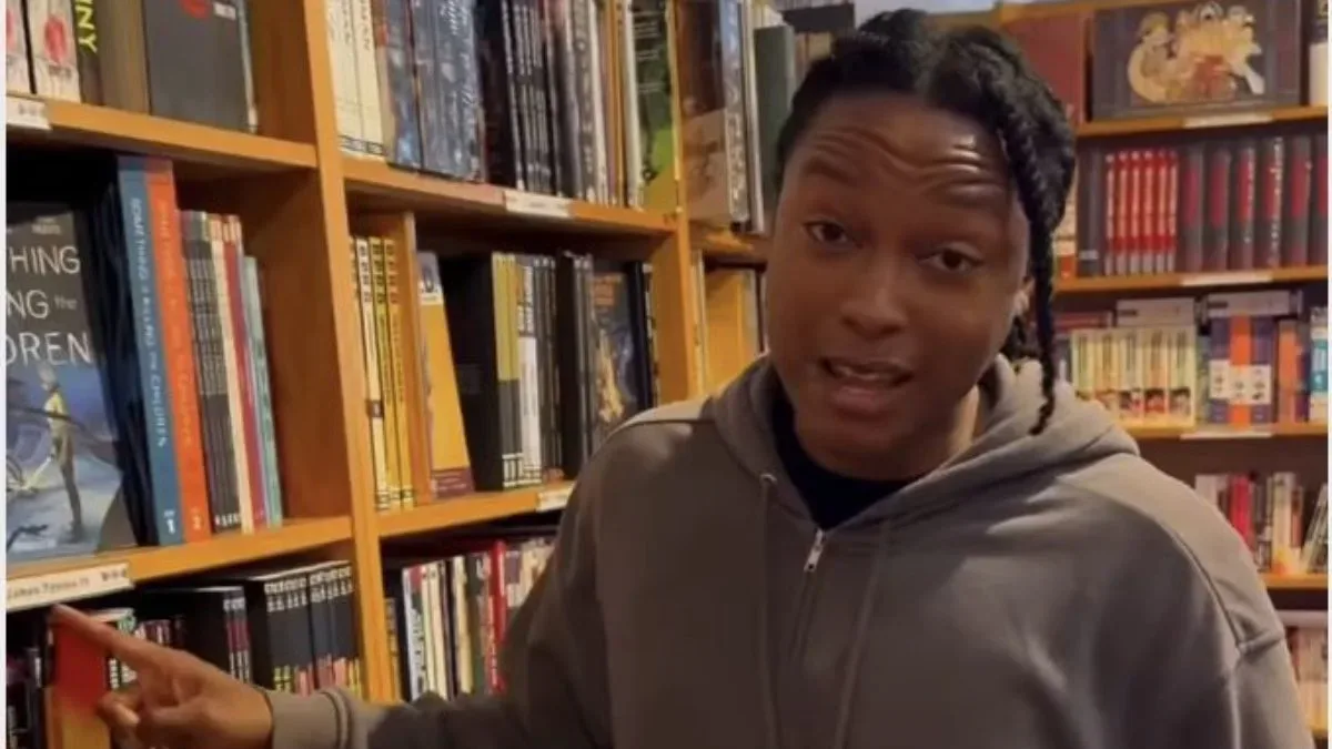Josh Johnson browsing shelves during a visit to an independent comic shop