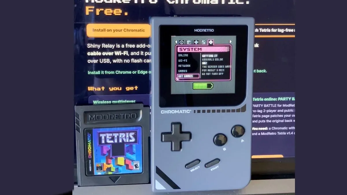 ModRetro Chromatic handheld displaying a game download menu