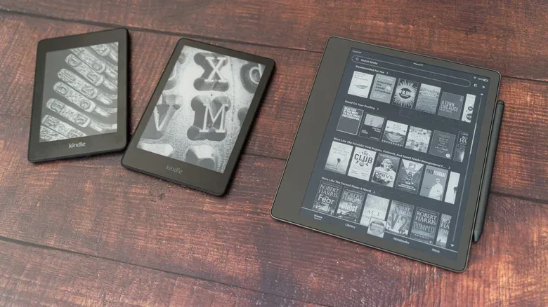 A Kindle connected to a computer with a USB cable for sideloading ebooks