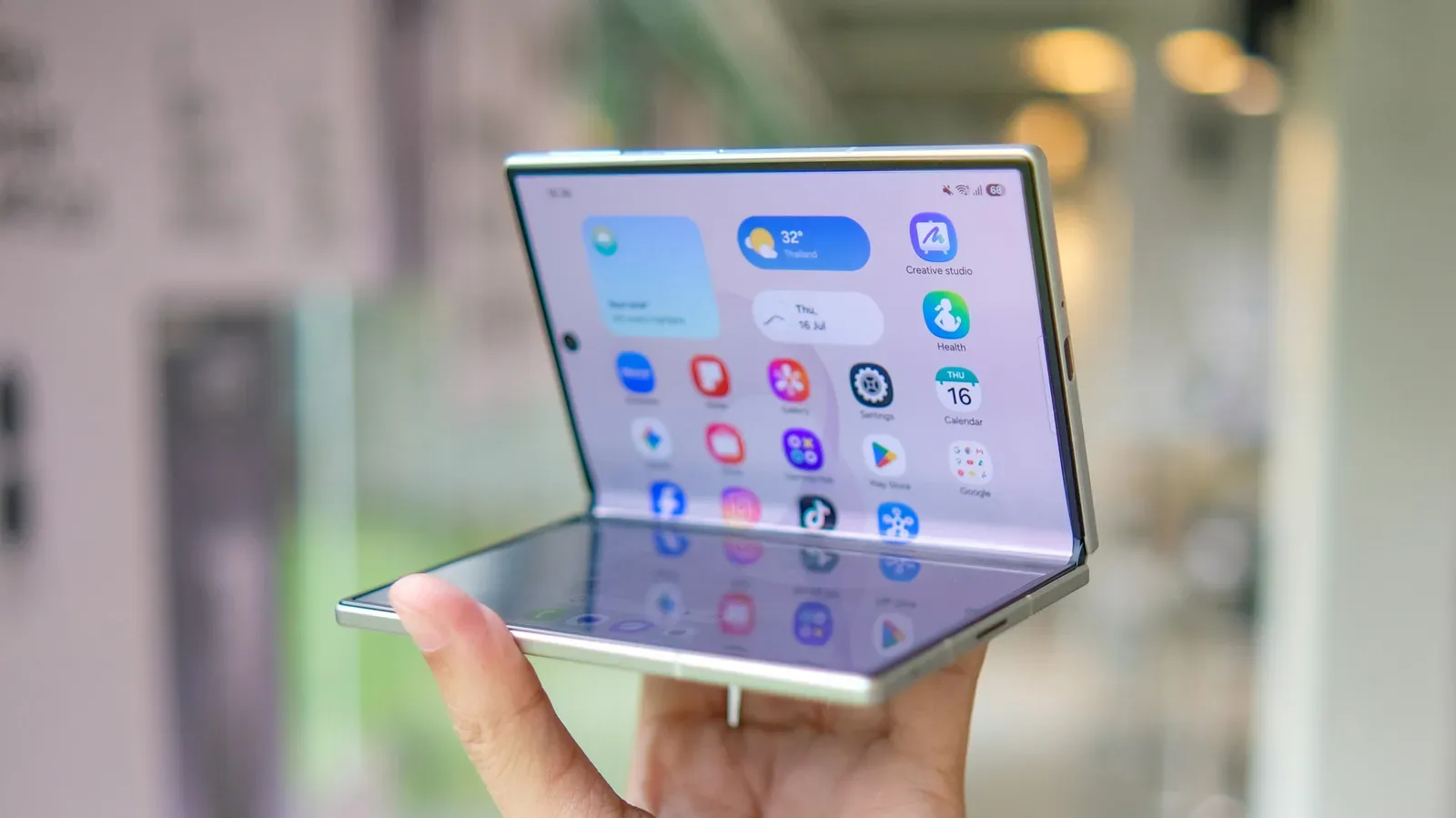 A foldable smartphone opened to show its flexible inner display and outer cover screen