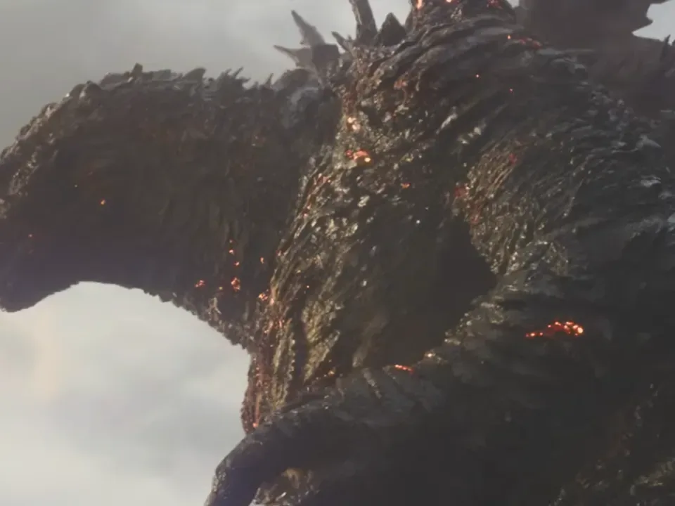 King Ghidorah’s gravity beams strike airborne structures in the Godzilla Minus Zero trailer