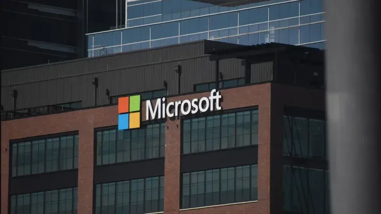 Rows of data-center servers representing Microsoft’s AI infrastructure investment