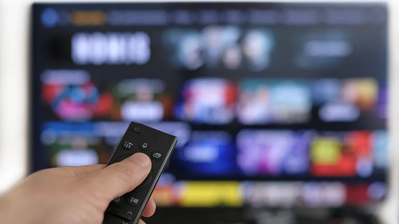 Smart TV home screen displaying streaming apps and software update settings