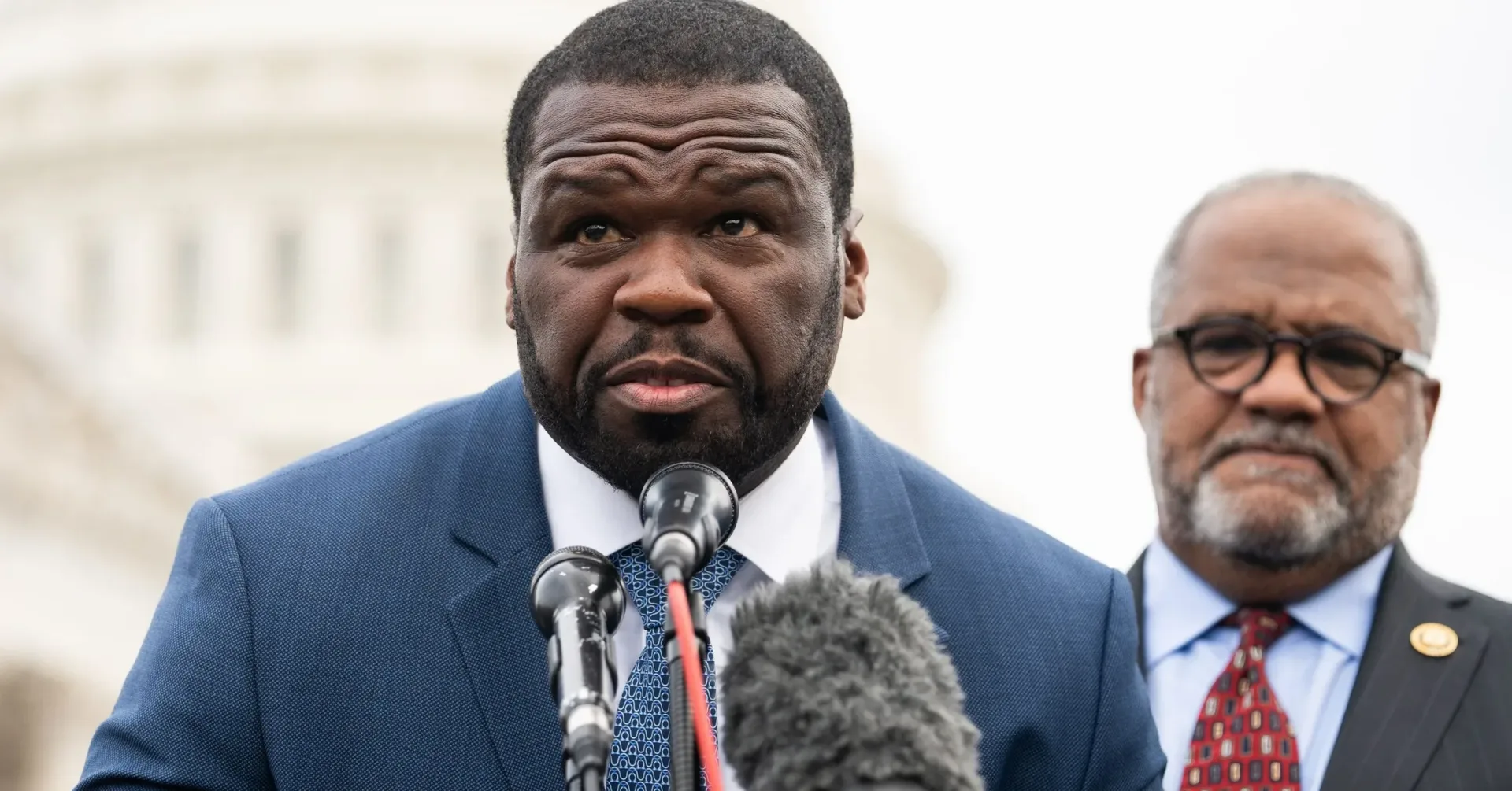 50 Cent during a late-night television interview discussing a funeral-style flower arrangement