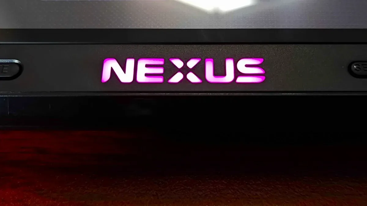 Close up of Evercade Nexus logo with RGB lighting set to purple.