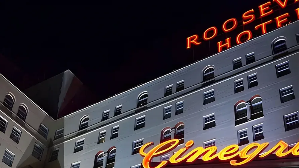 Historic El Capitan Theatre on a Ghosts of Hollywood nighttime walking route