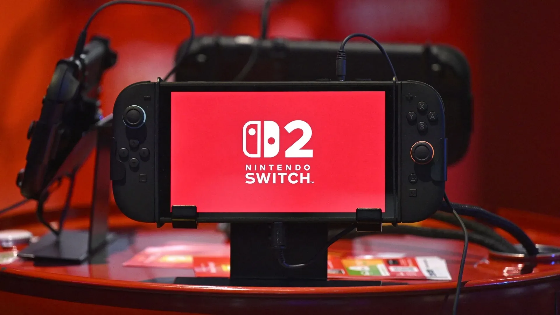 Netflix gaming interface displayed on a television with a smartphone used as a controller