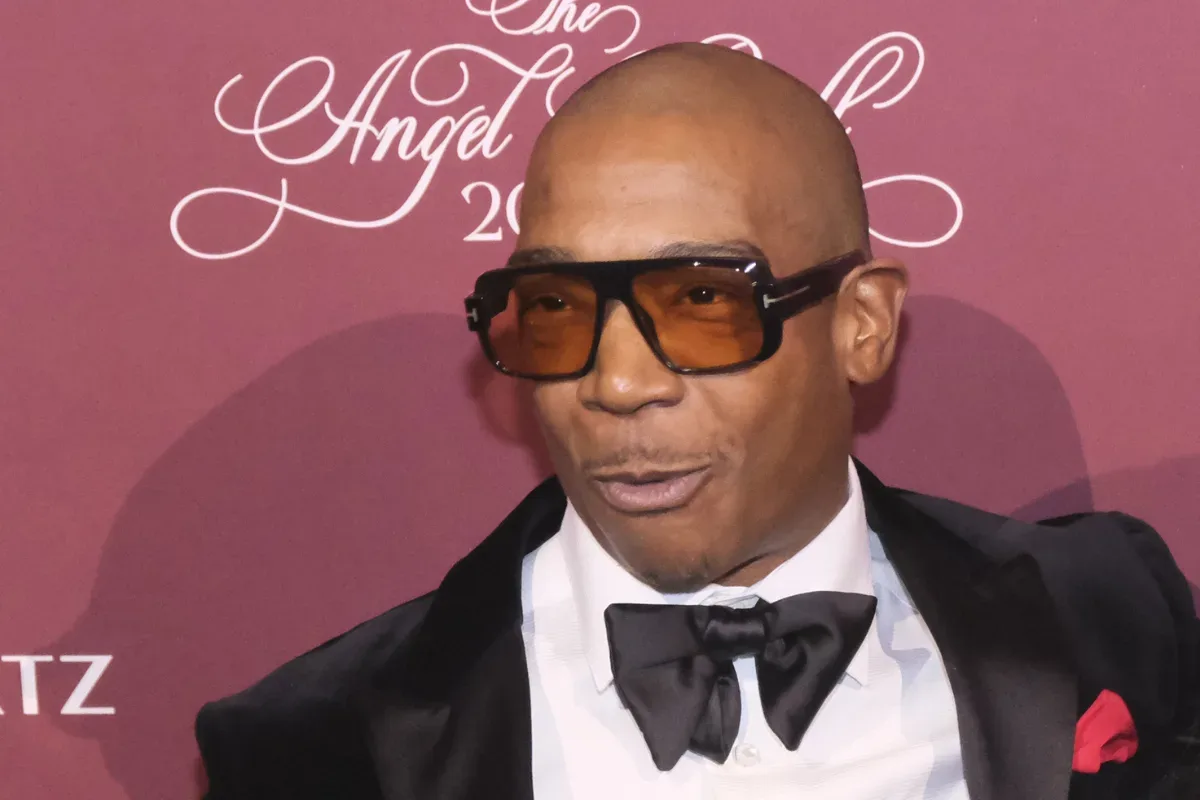 Ja Rule promoting Amber & Opal whiskey during a retail tasting event