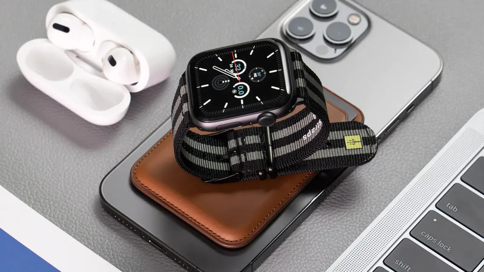Close view of nylon Apple Watch band hardware in black, silver and gold
