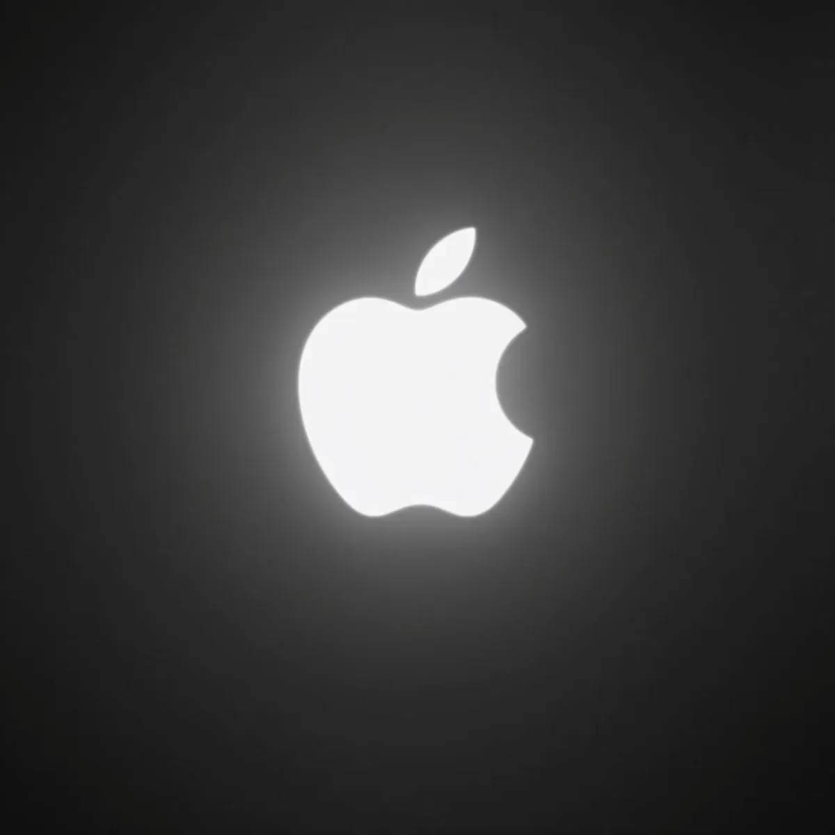 The Glowing Apple Logo Is Returning to MacBook Pro, but OLED Changes How It Can Work