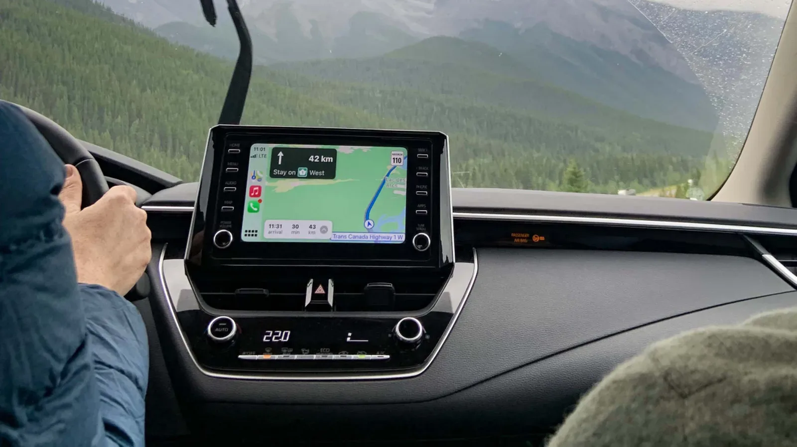 Apple CarPlay dashboard displaying turn-by-turn navigation