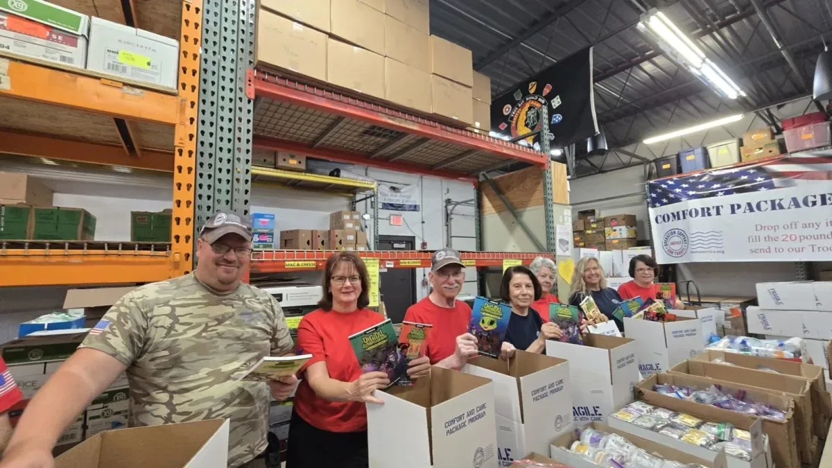 Stacks of Digital Lizards of Doom graphic novels prepared for distribution to military families