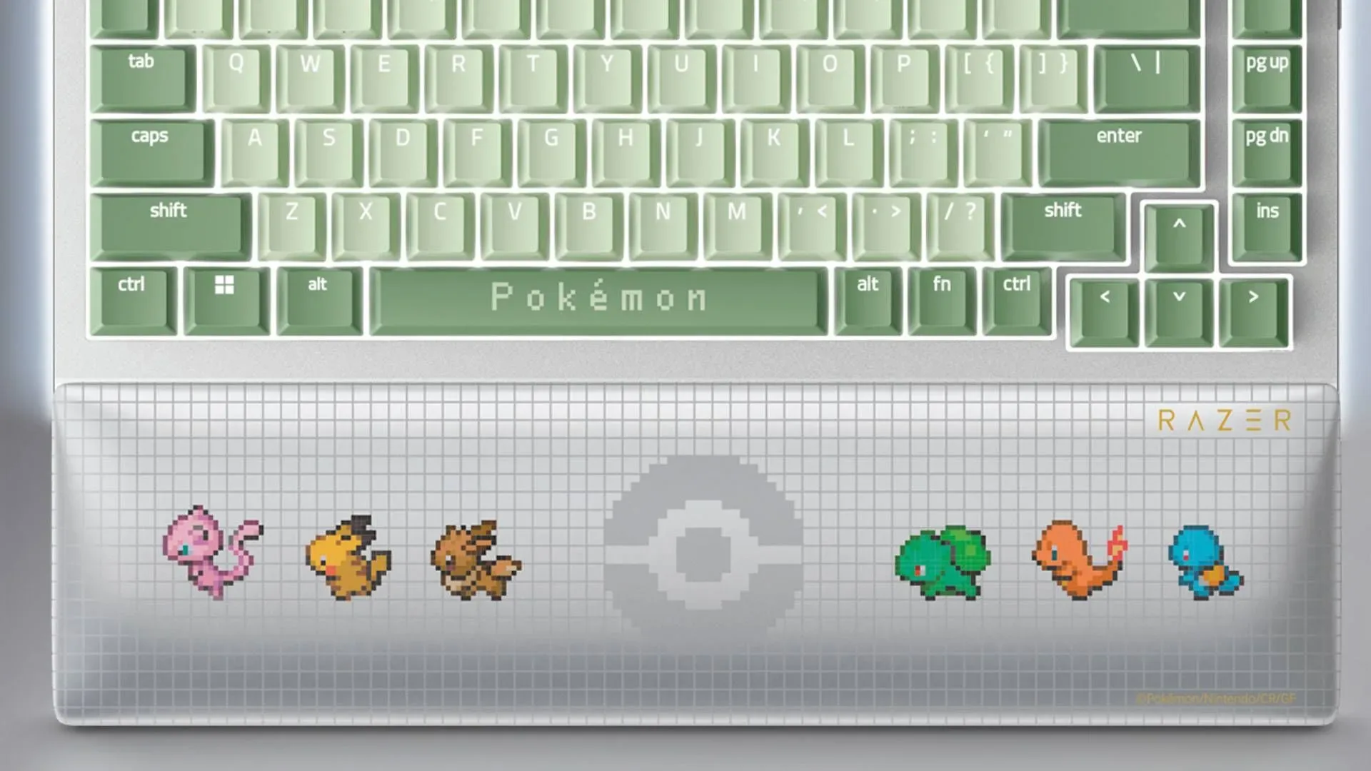 Razer Pokémon Pixel Art gaming chair with a pixel-art Pokémon Center scene and first-generation Pokémon sprites