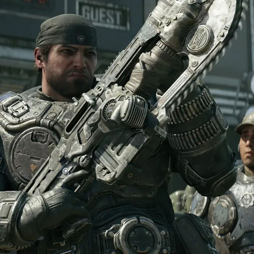 Gears of War: E-Day combat scene featuring a COG soldier behind cover
