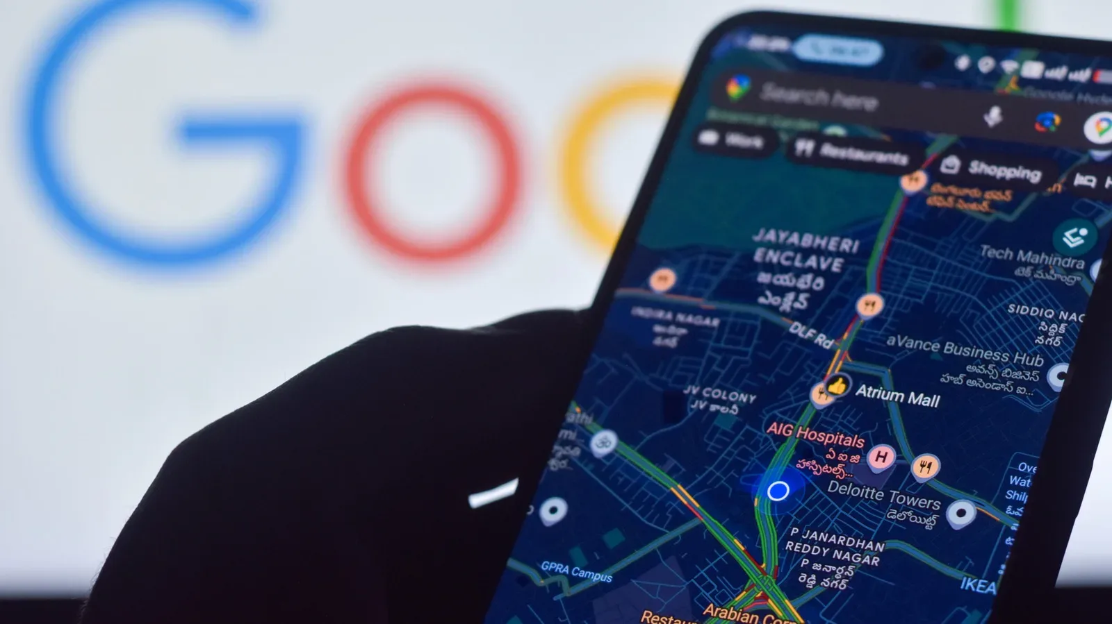 Android phone showing an imprecise blue location dot in a map app