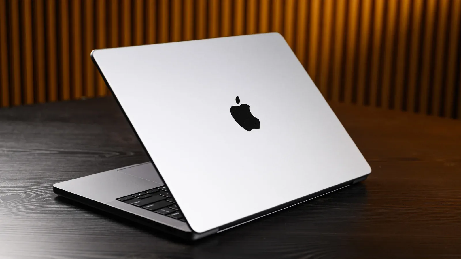 A lineup of MacBook laptop designs illustrating two decades of Apple portable computer evolution