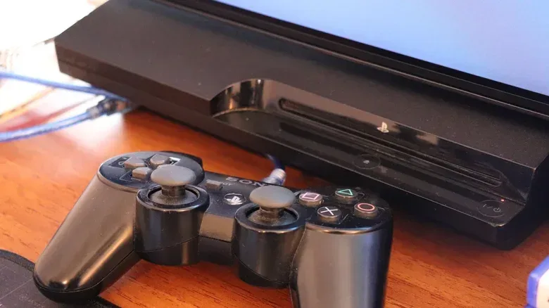 A DualShock 4 controller connected for use with another device