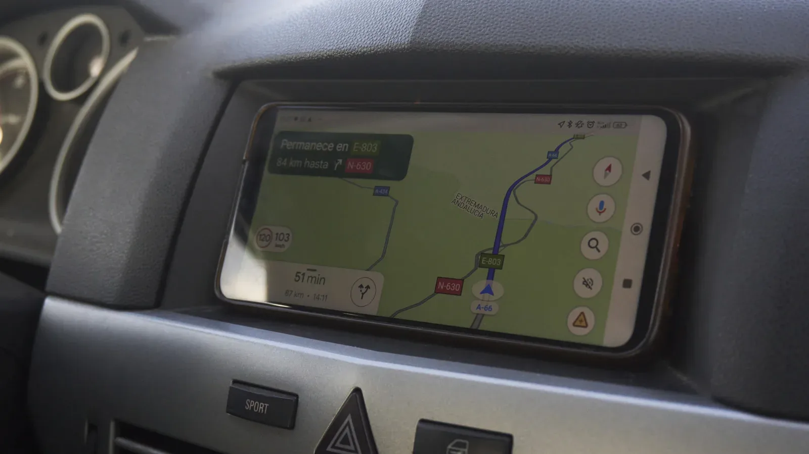 A smartphone map displaying a blue location dot and route guidance