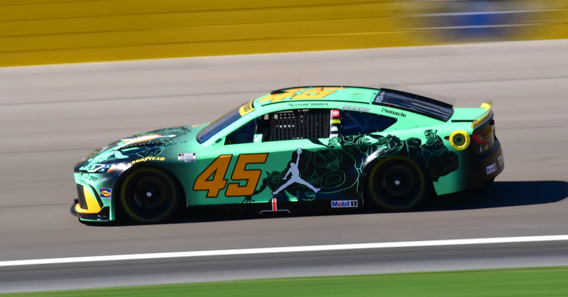 Tyler Reddick’s bright green No. 45 Toyota with Monstars-inspired Space Jam paint scheme