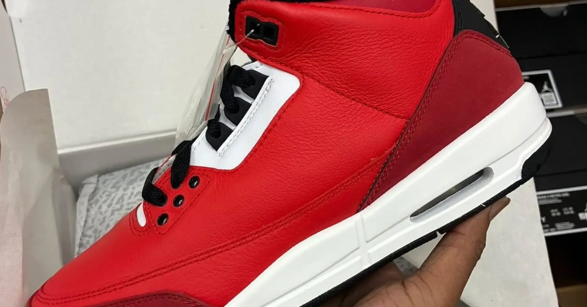 Air Jordan 3 Santa kids sneaker with red leather upper and white tongue