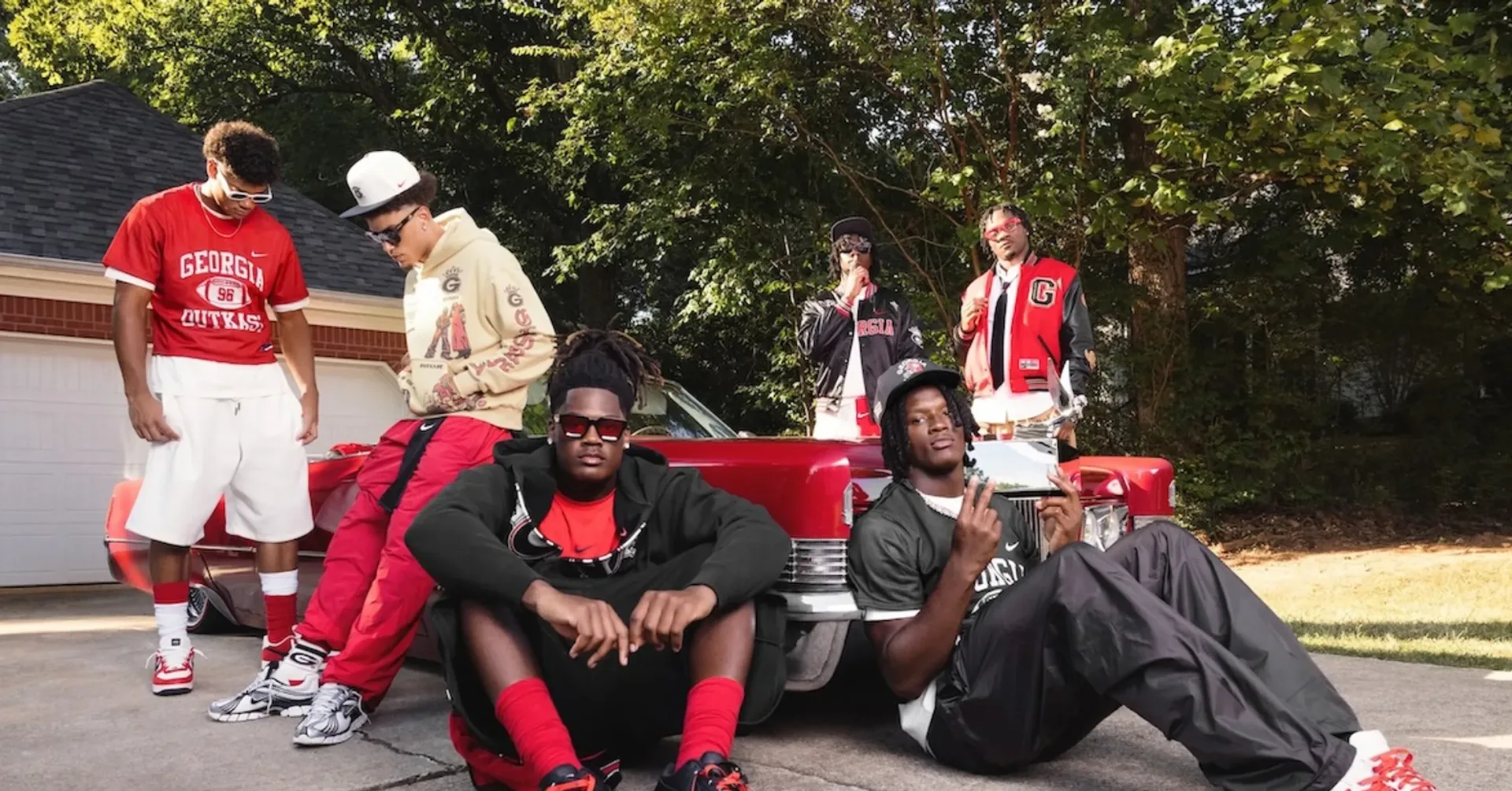 Red Nike x Georgia x Outkast Destroyer jacket with black leather sleeves