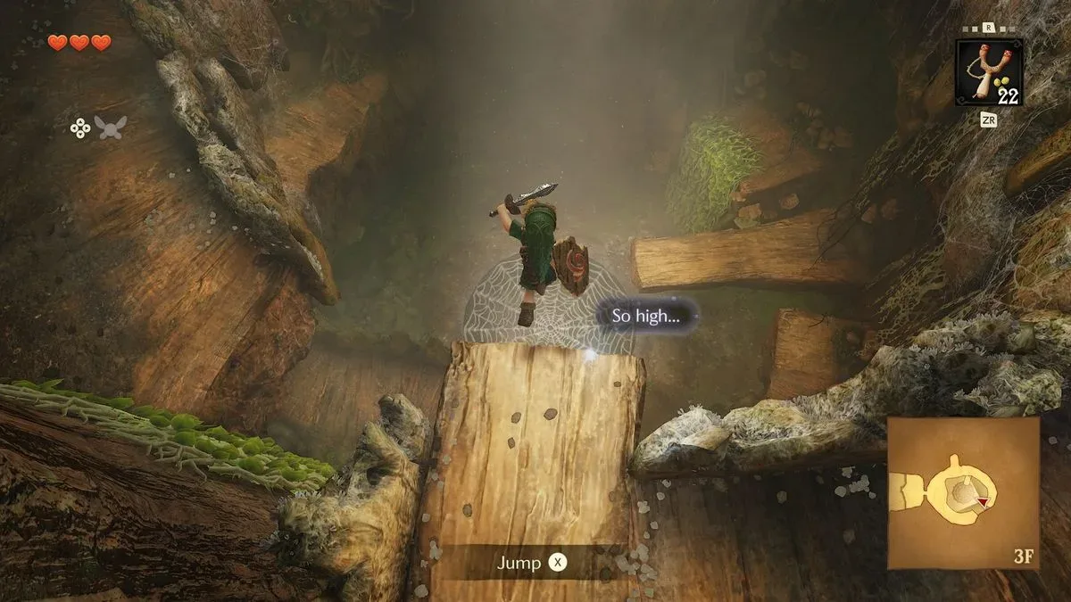 Inside The Great Deku Tree, Link jumps off a wooden ledge in The Legend of Zelda: Ocarina of Time remake