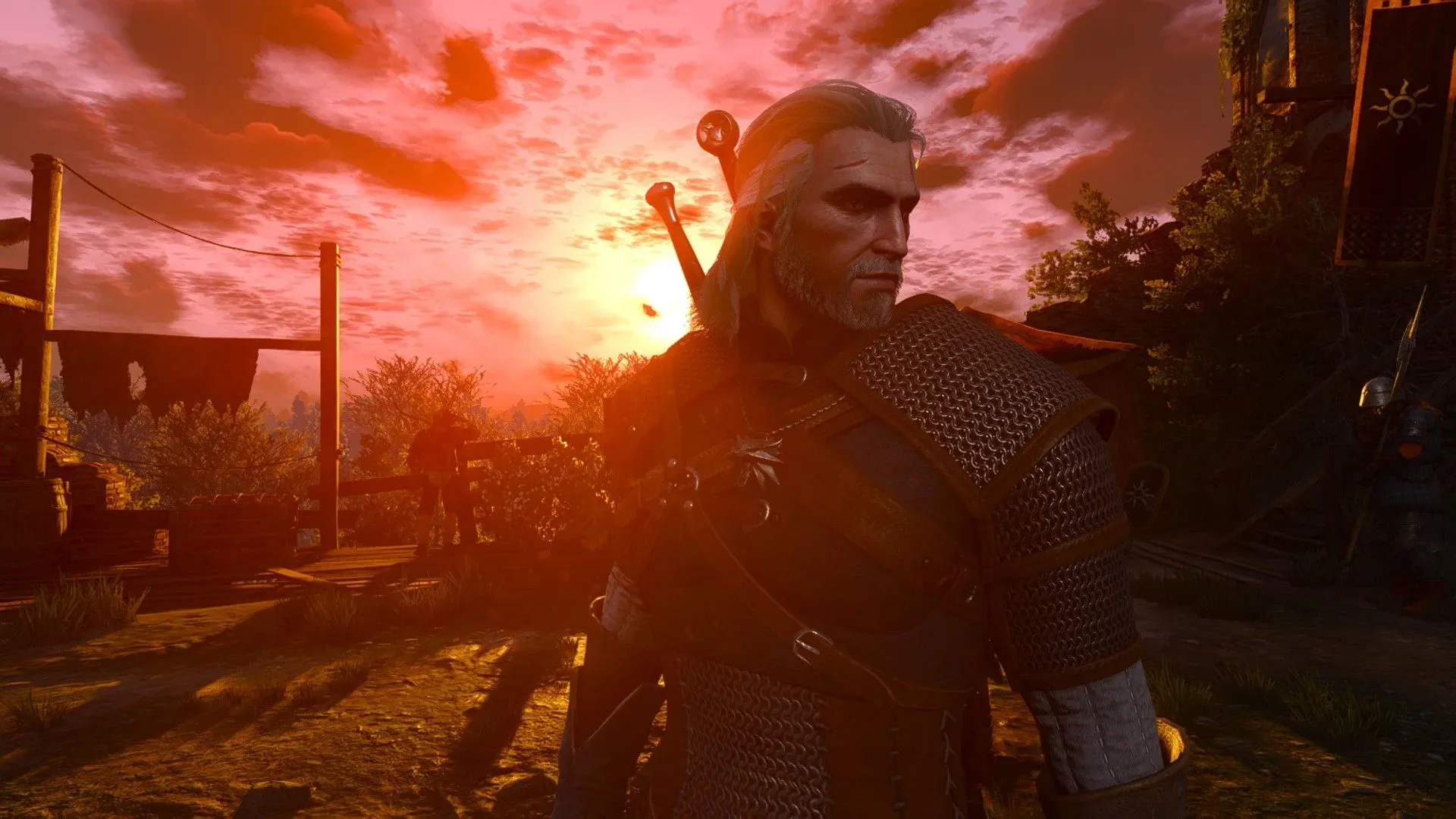 Geralt overlooking White Orchard at sunset in The Witcher 3: Wild Hunt – Remastered