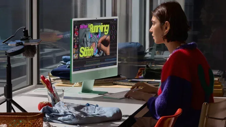A person using a desktop computer,
