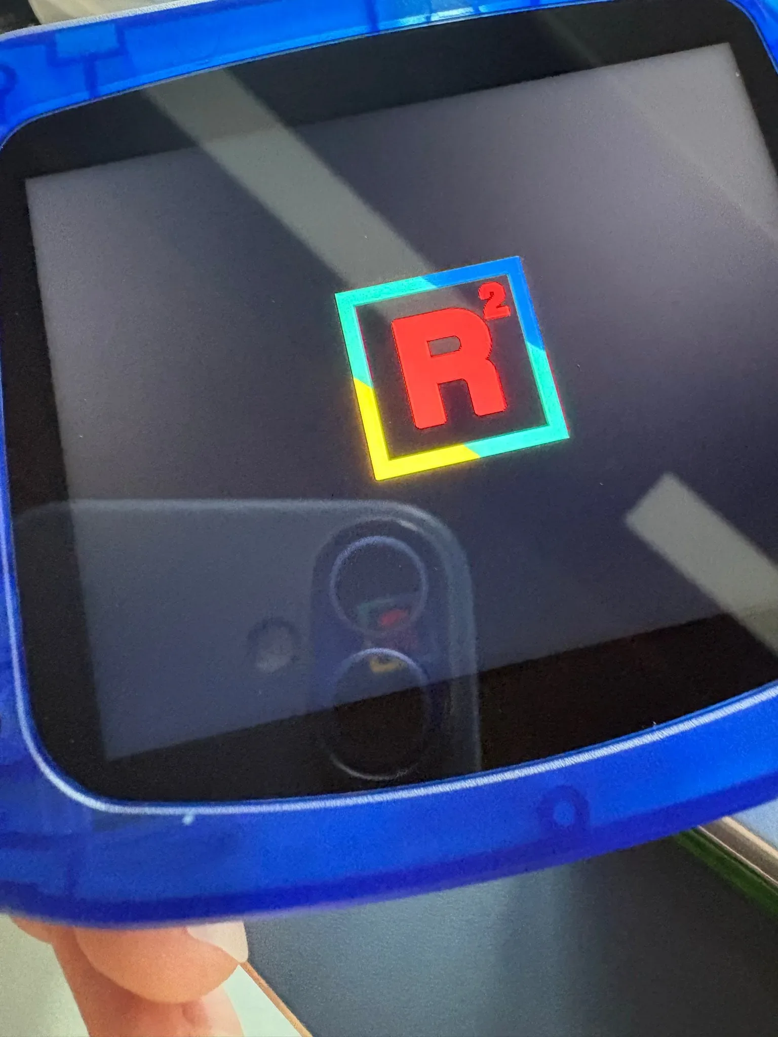 FPGA Game Boy Advance SP-style prototype showing its boot screen