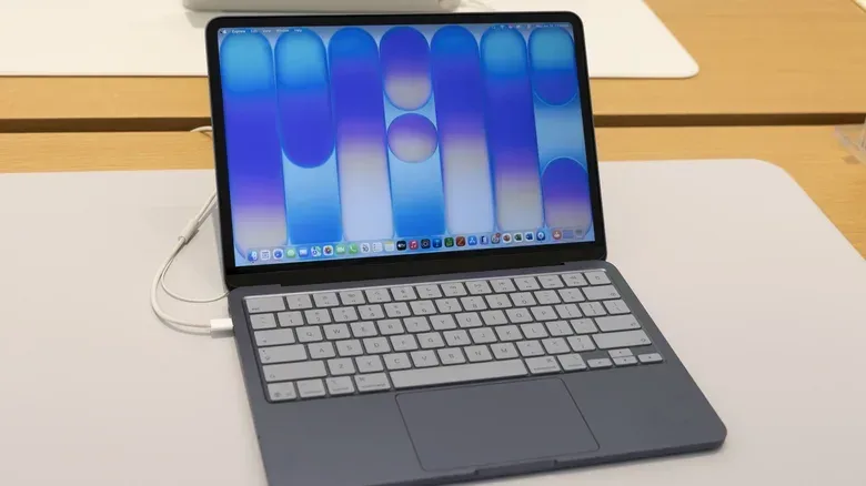 Close view of a MacBook Neo connected to an external monitor through USB
