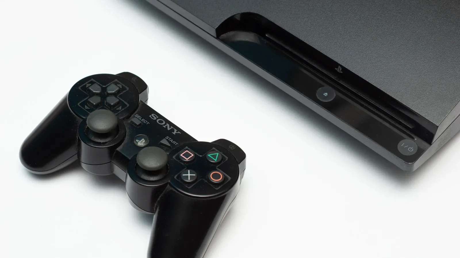 A PlayStation 3 console connected to a television for physical media playback