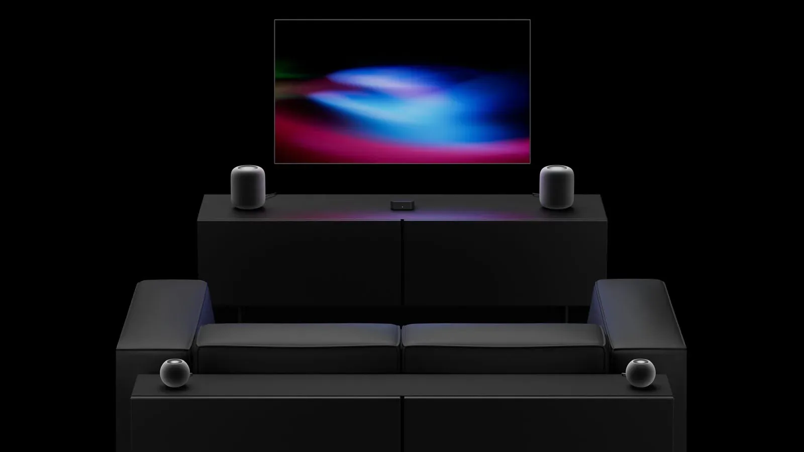 Fourth-generation Apple TV 4K with four supported HomePod speakers arranged for surround sound