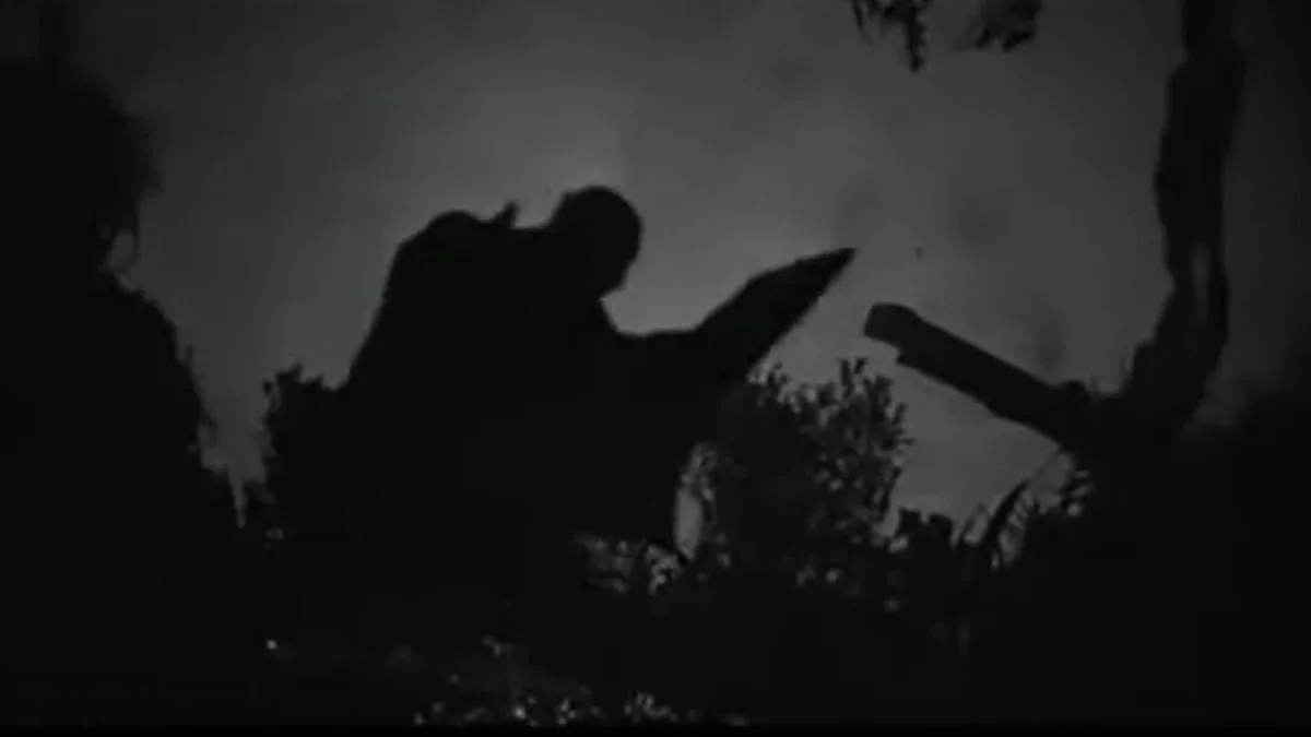 The Bat Whispers screen capture showing the 1930 mystery film discussed as an influence on early Batman