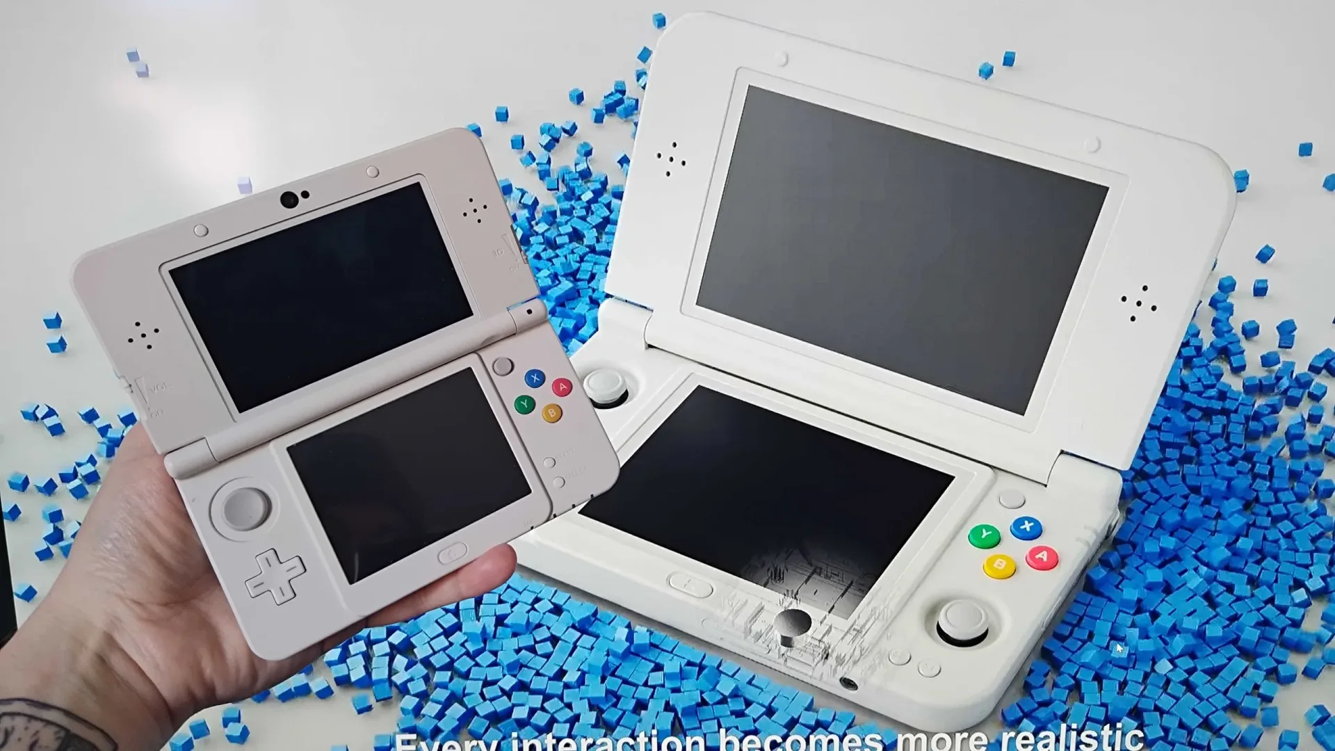 Anbernic RG DDS dual-screen clamshell handheld shown open