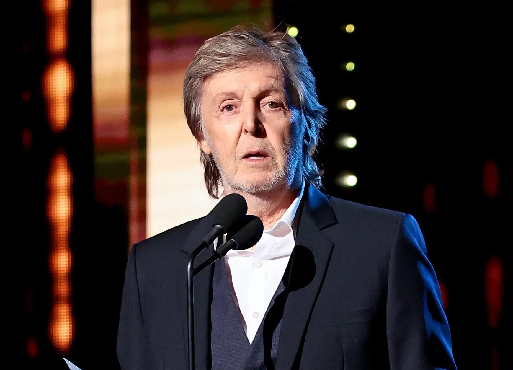 Paul McCartney speaking about his concern over how Beatles films portray his height beside John Lennon