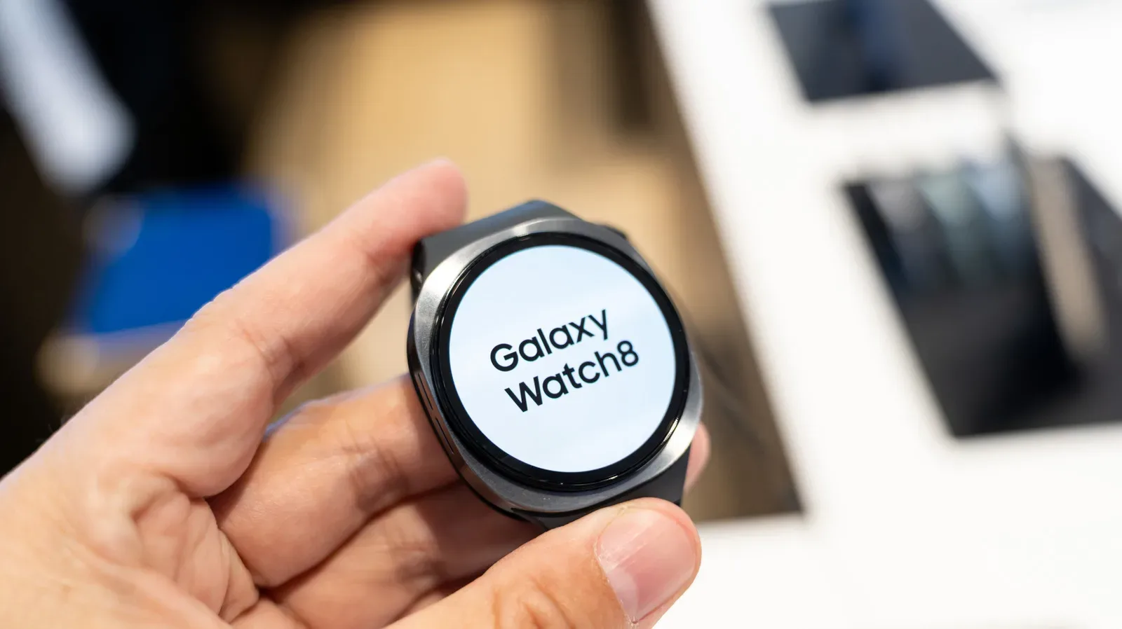 Samsung Galaxy Watch charging during a daytime desk break