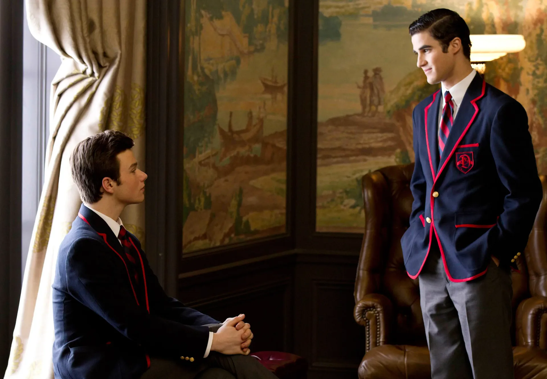 Darren Criss and Chris Colfer perform together during a Glee reunion moment at Royal Albert Hall
